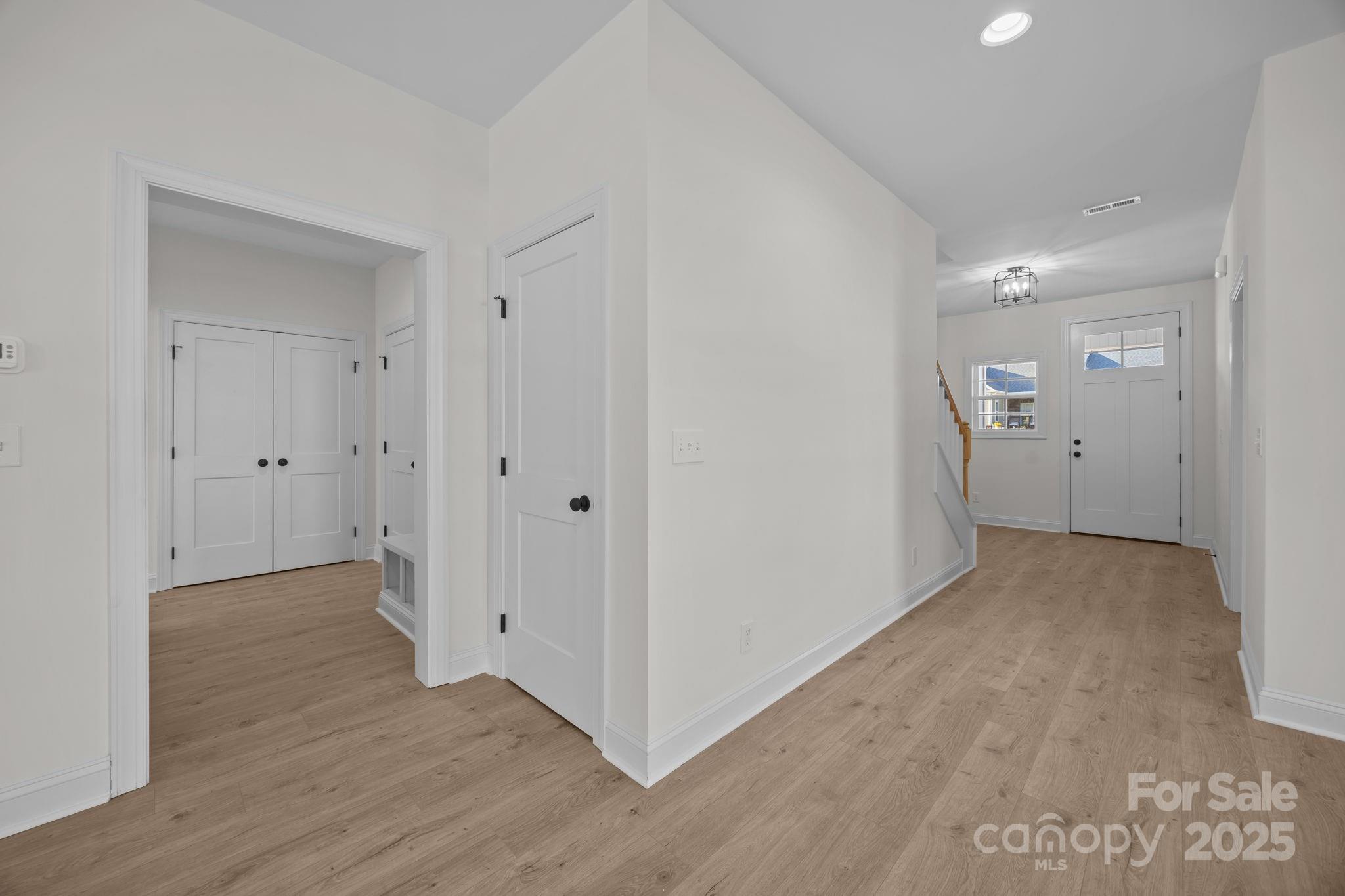1325 Coppergate Drive Salisbury, NC 28147 - Photo 6 of 47 a view of a hallway with wooden floor