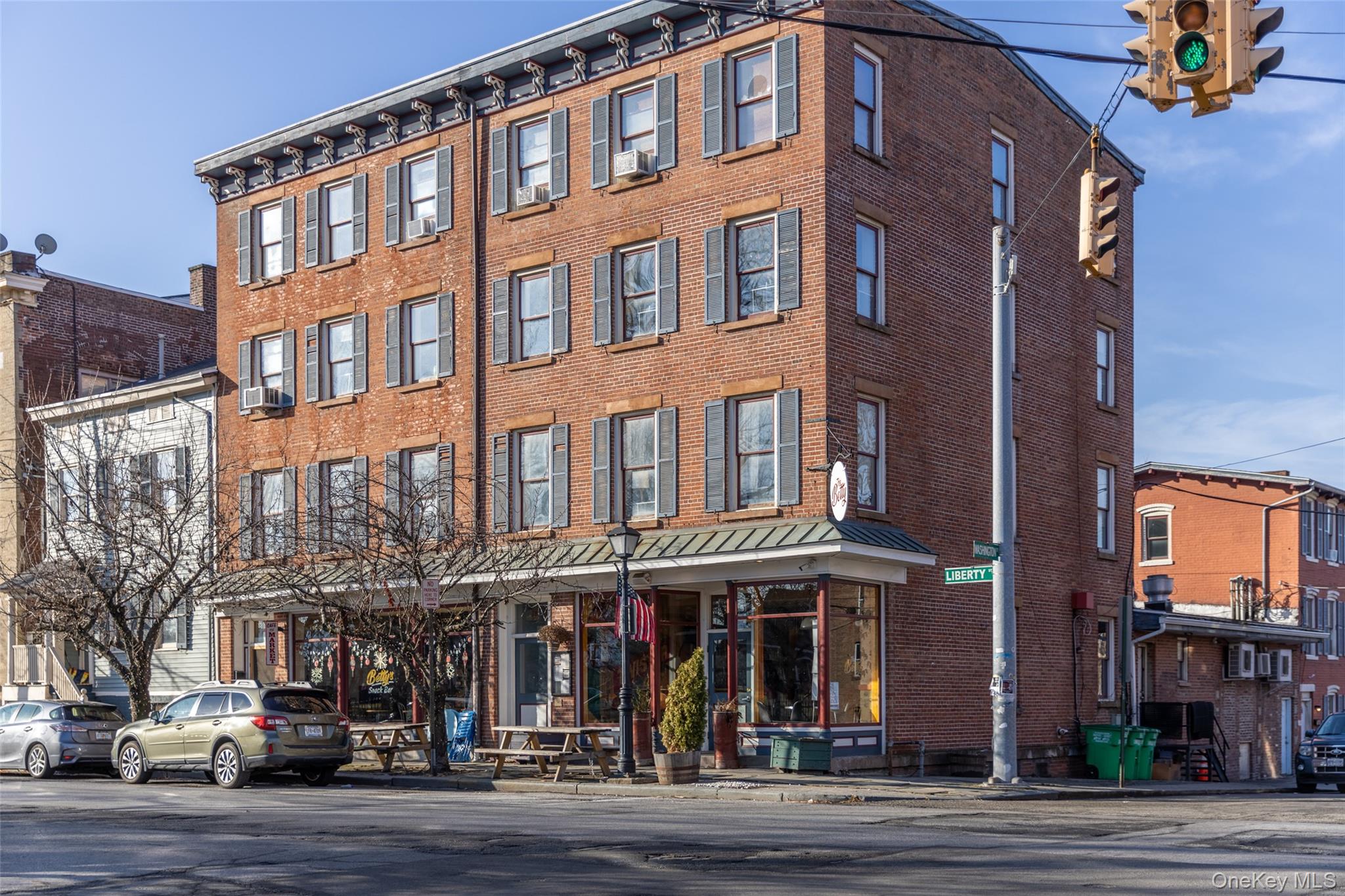 97 Liberty Street, Unit 3S Newburgh, NY 12550 - Photo 1 of 1 a front view of a building and a street