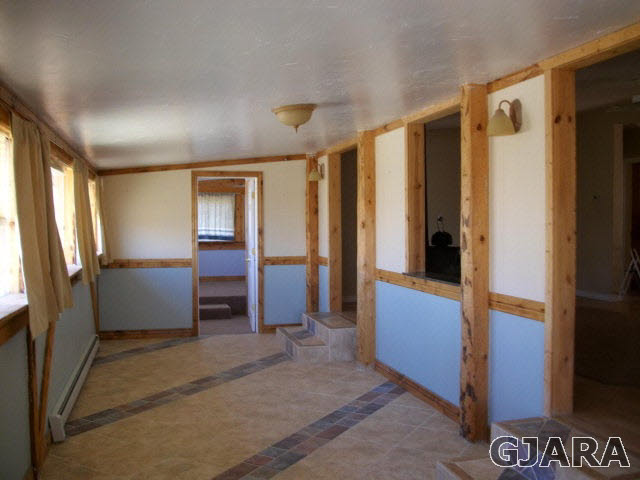602 39 Road Palisade, CO 81526 - Photo 14 of 19 a view of hallway with cabinets and furniture