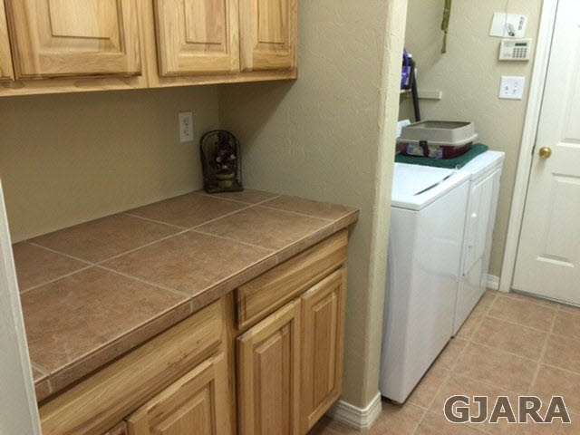 602 39 Road Palisade, CO 81526 - Photo 8 of 19 a utility room with dryer and washer