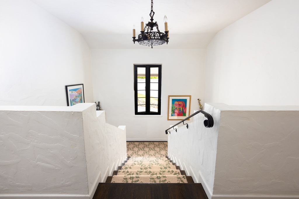 5 Southwick Road Newton, MA 02468 - Photo 12 of 25 a view of a hallway with windows