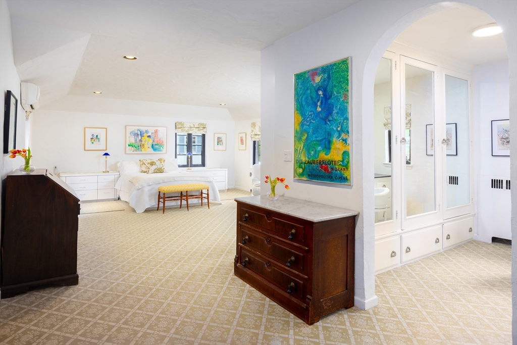 5 Southwick Road Newton, MA 02468 - Photo 13 of 25 a living room with furniture and a dresser