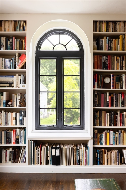 5 Southwick Road Newton, MA 02468 - Photo 19 of 25 a view of a book shelf with lots of windows and a book shelf