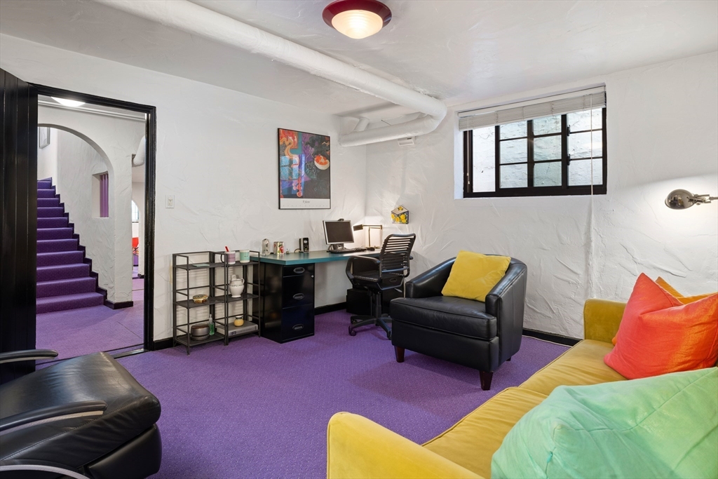 5 Southwick Road Newton, MA 02468 - Photo 21 of 25 a living room with furniture and a mirror