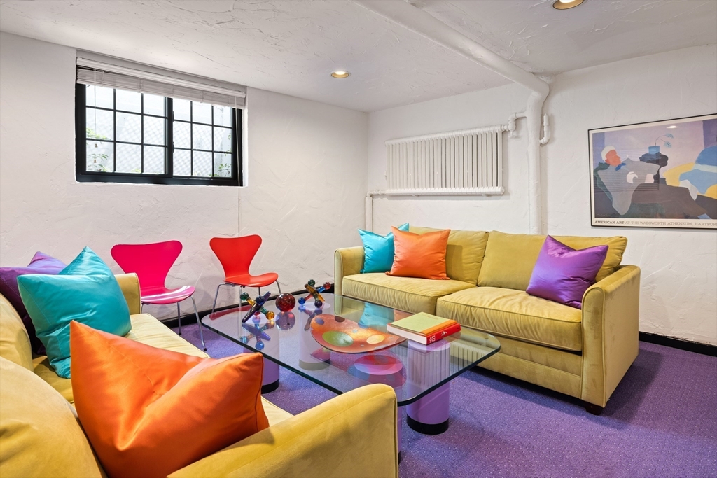 5 Southwick Road Newton, MA 02468 - Photo 22 of 25 a living room with furniture and a couch