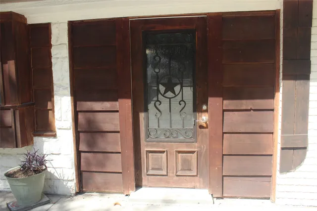 a backyard of a house with lots of green space