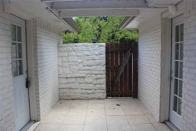 a kitchen with a refrigerator stove and microwave