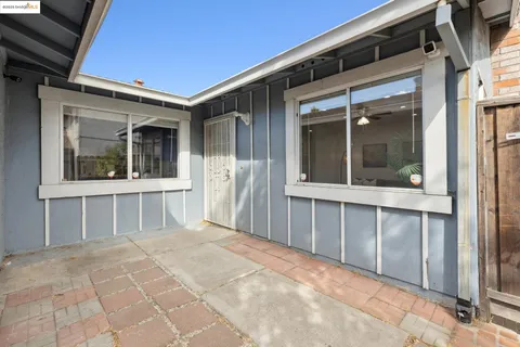 a view of a house with a large window