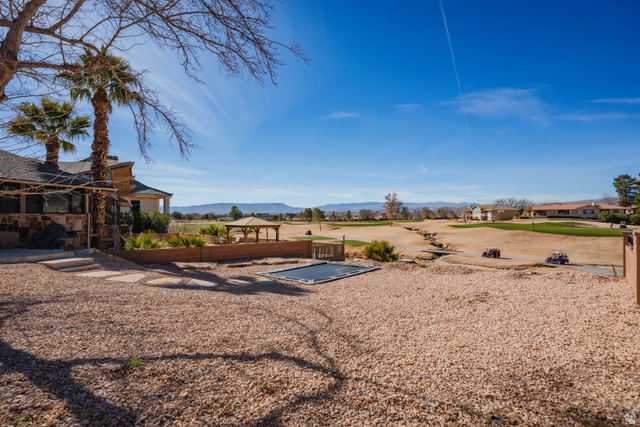980 Cactus Circle St. George, UT 84790 - Photo 65 of 77 View of yard with a gazebo and a mountain view