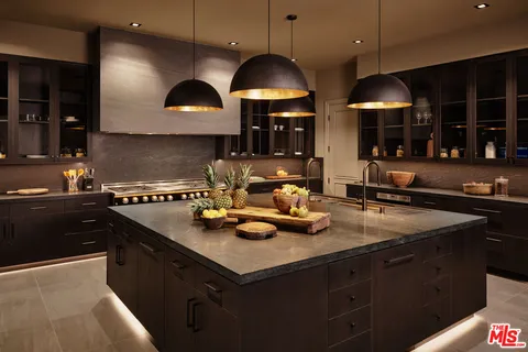 an aerial view of a house with a garden