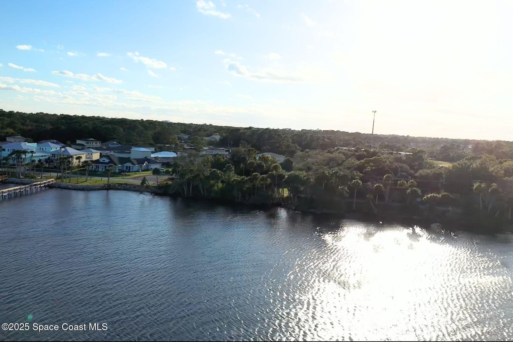 5122 Riveredge Drive Titusville, FL 32780 - Photo 4 of 15 a view of a lake
