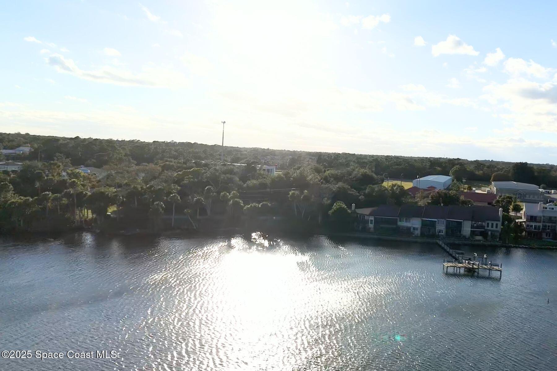 5122 Riveredge Drive Titusville, FL 32780 - Photo 5 of 15 a view of city and mountain