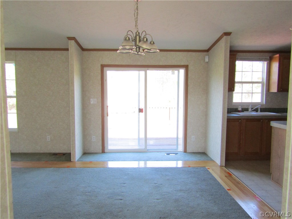17622 Fox Branch Road Carson, VA 23830 - Photo 13 of 30 an empty room with windows and entrance