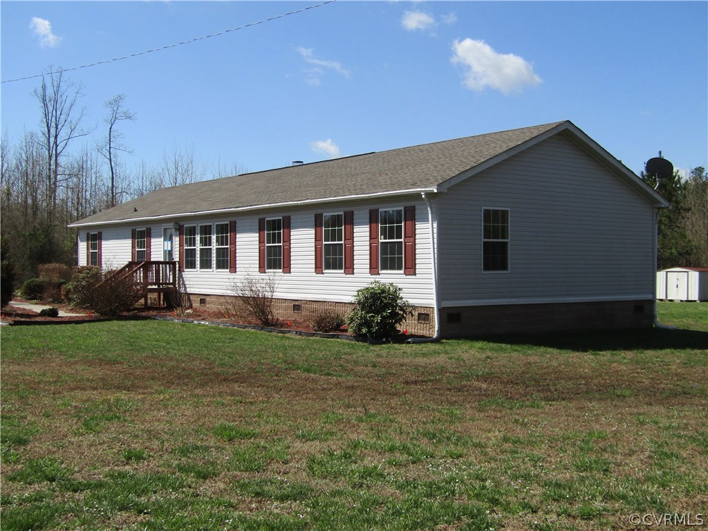 17622 Fox Branch Road Carson, VA 23830 - Photo 2 of 30 a front view of house with yard and green space
