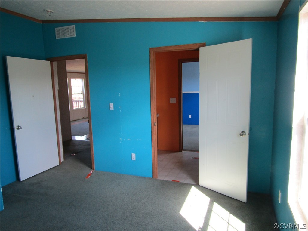 17622 Fox Branch Road Carson, VA 23830 - Photo 26 of 30 a view of an empty room with closet and wooden floor