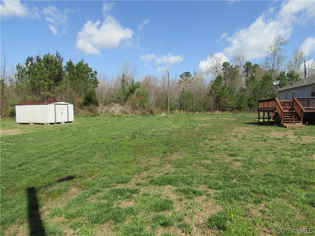 17622 Fox Branch Road Carson, VA 23830 - Photo 5 of 30 a view of a field with grass and trees
