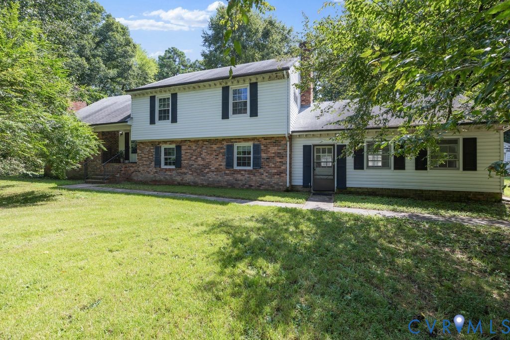16064 Binns Road Doswell, VA 23047 - Photo 1 of 35 front view of a house with a yard