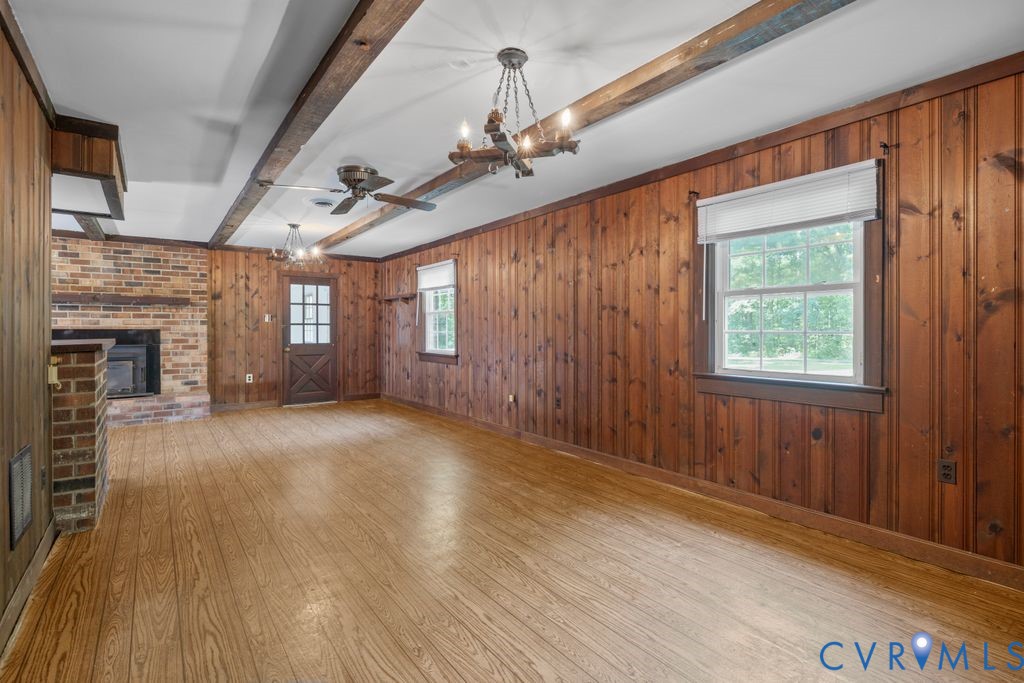 16064 Binns Road Doswell, VA 23047 - Photo 19 of 35 wooden floor in an empty room with a window