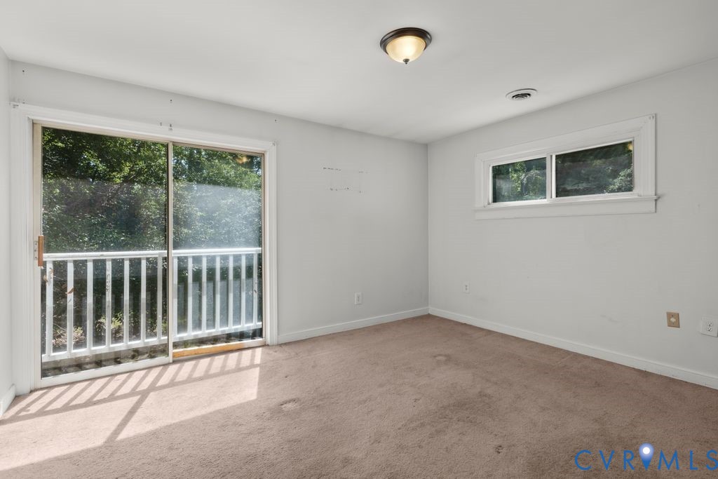 16064 Binns Road Doswell, VA 23047 - Photo 23 of 35 a view of an empty room with a window