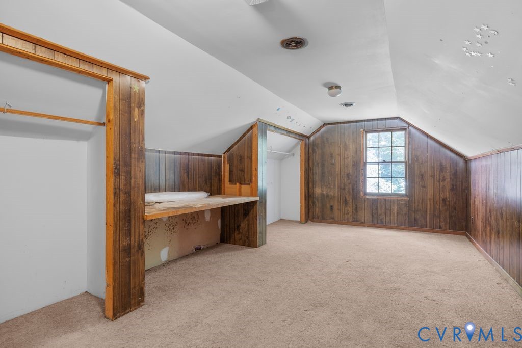 16064 Binns Road Doswell, VA 23047 - Photo 28 of 35 a view of an empty room with window and cabinet