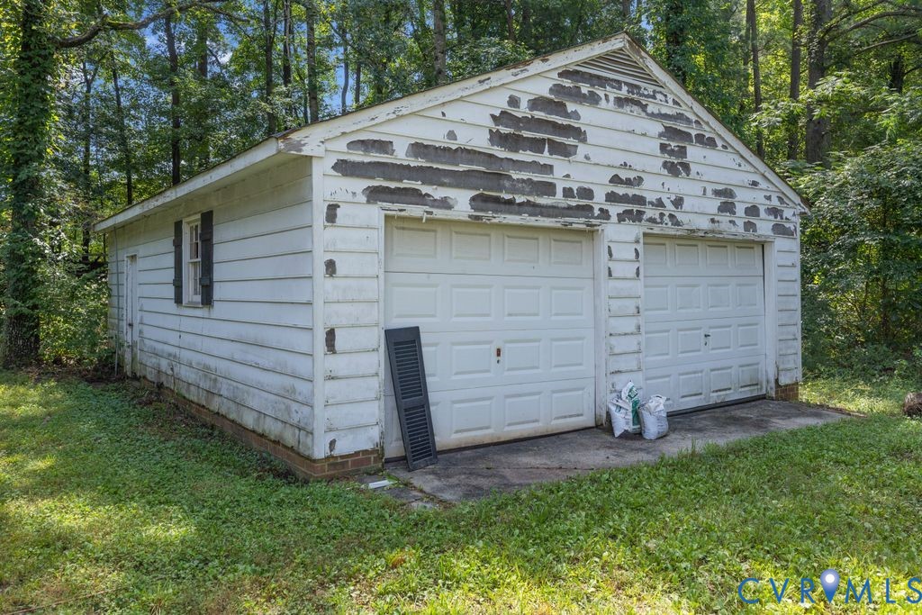 16064 Binns Road Doswell, VA 23047 - Photo 34 of 35 a view of a house with a backyard
