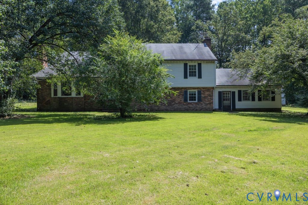 16064 Binns Road Doswell, VA 23047 - Photo 4 of 35 a front view of a house with a yard