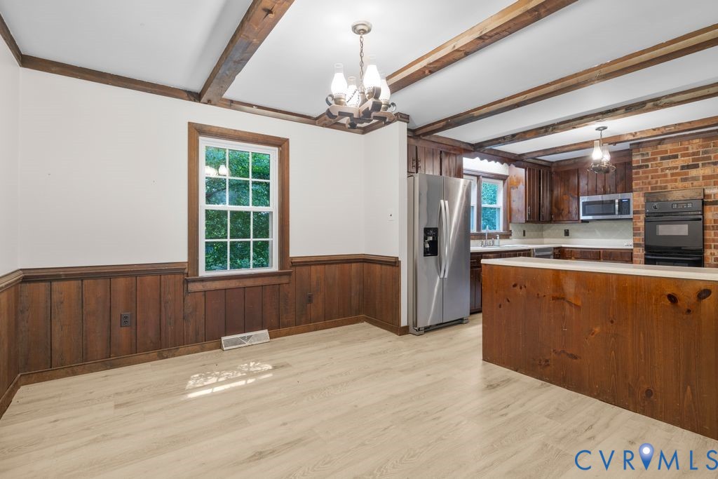 16064 Binns Road Doswell, VA 23047 - Photo 10 of 35 a view of kitchen with refrigerator and window