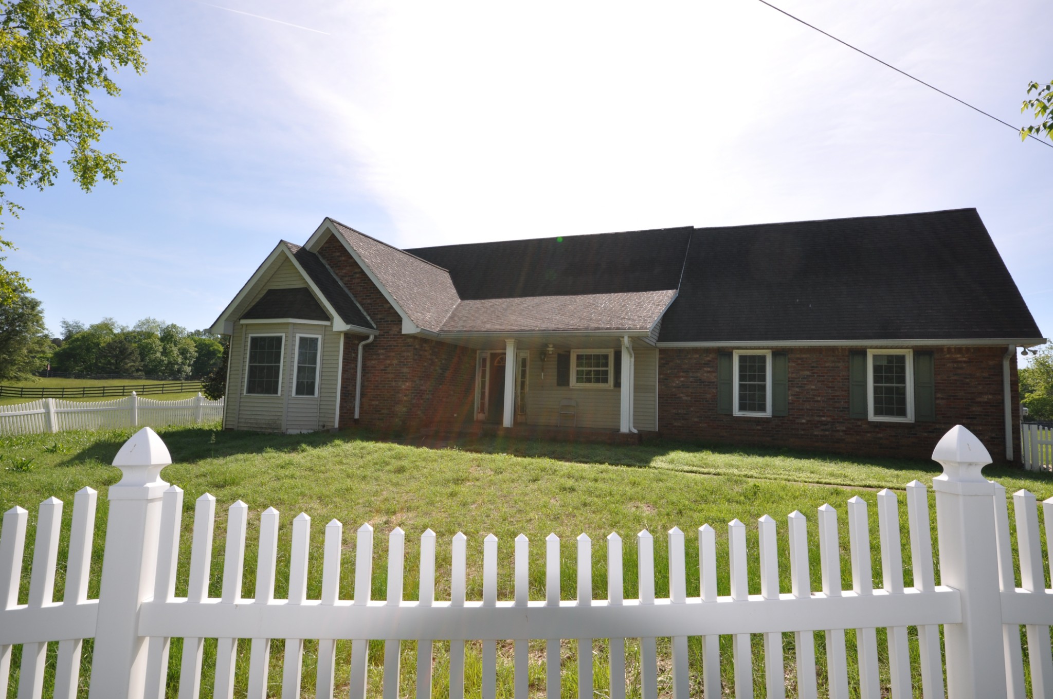 5620 Sango Road Cedar Hill, TN 37032 - Photo 3 of 37 a front view of a house with garden
