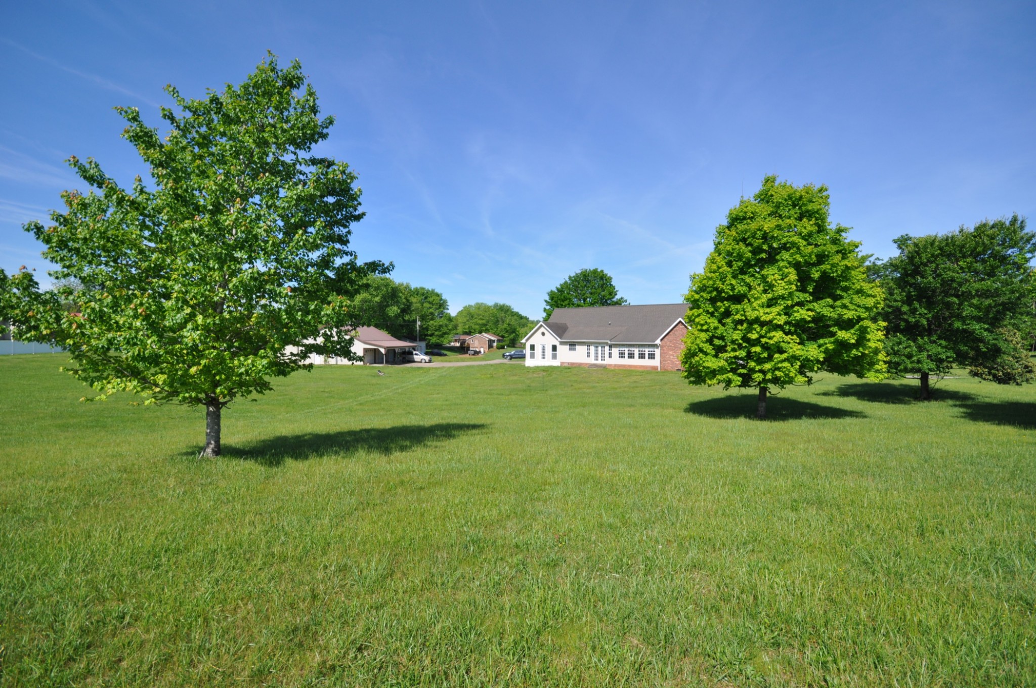 5620 Sango Road Cedar Hill, TN 37032 - Photo 8 of 37 a view of green field with trees