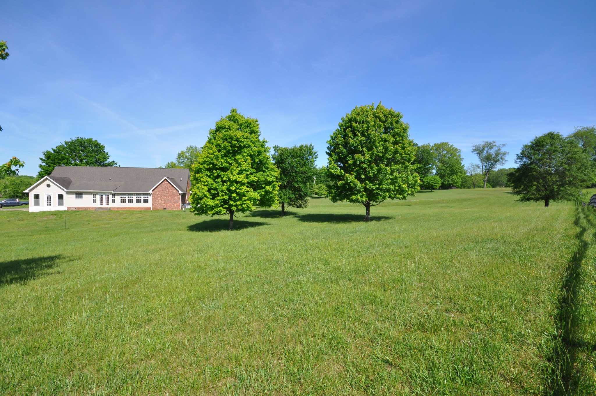 5620 Sango Road Cedar Hill, TN 37032 - Photo 9 of 37 a view of a garden with a tree