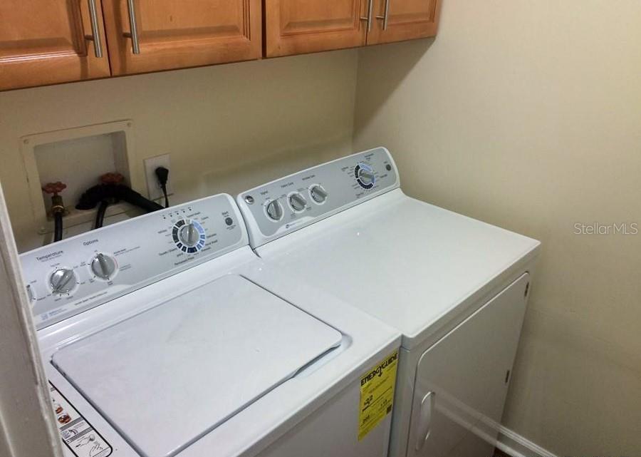 2905 Southwest Archer Road, Unit 4002 Gainesville, FL 32608 - Photo 6 of 8 a utility room with dryer and washer