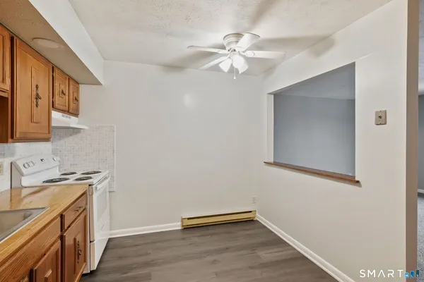 a view of a storage & utility room with a sink