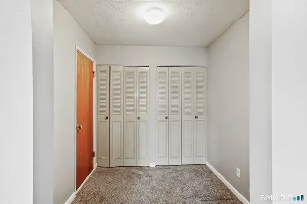 a view of room with hardwood floor