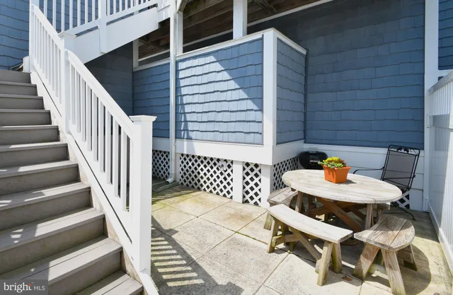 a front view of building with outdoor seating