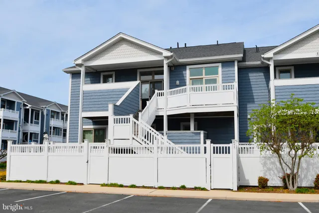 a view of house with a garden
