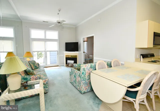 a kitchen with a sink a stove and cabinets