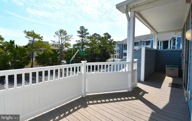 a bedroom with a bed and a chair