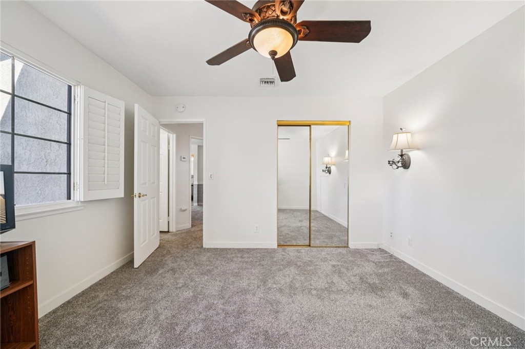 56 Dearborn Circle Redlands, CA 92374 - Photo 34 of 50 wooden floor in an empty room