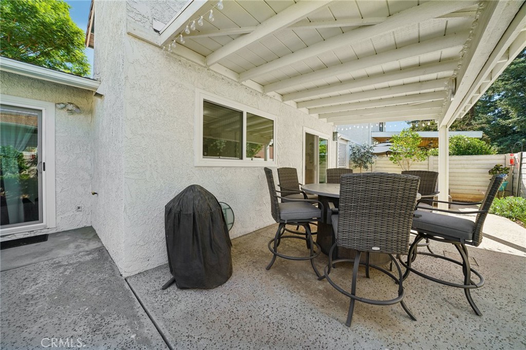 56 Dearborn Circle Redlands, CA 92374 - Photo 41 of 50 a view of a patio with furniture and a backyard