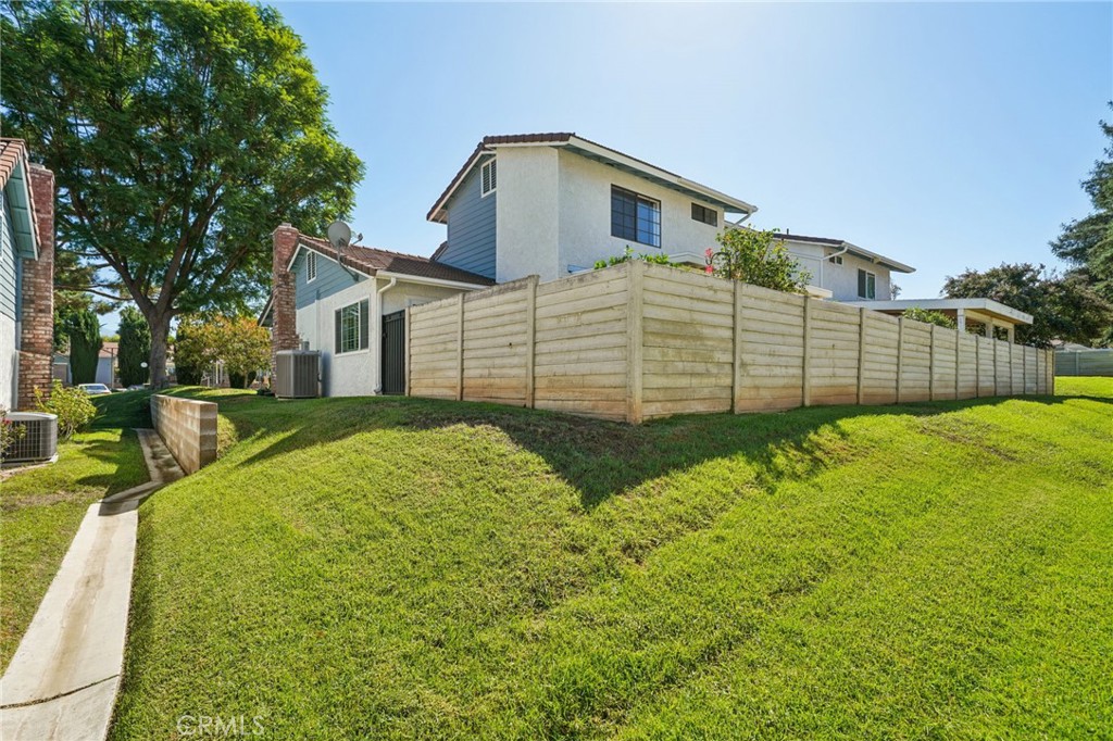 56 Dearborn Circle Redlands, CA 92374 - Photo 43 of 50 a front view of a house with a yard