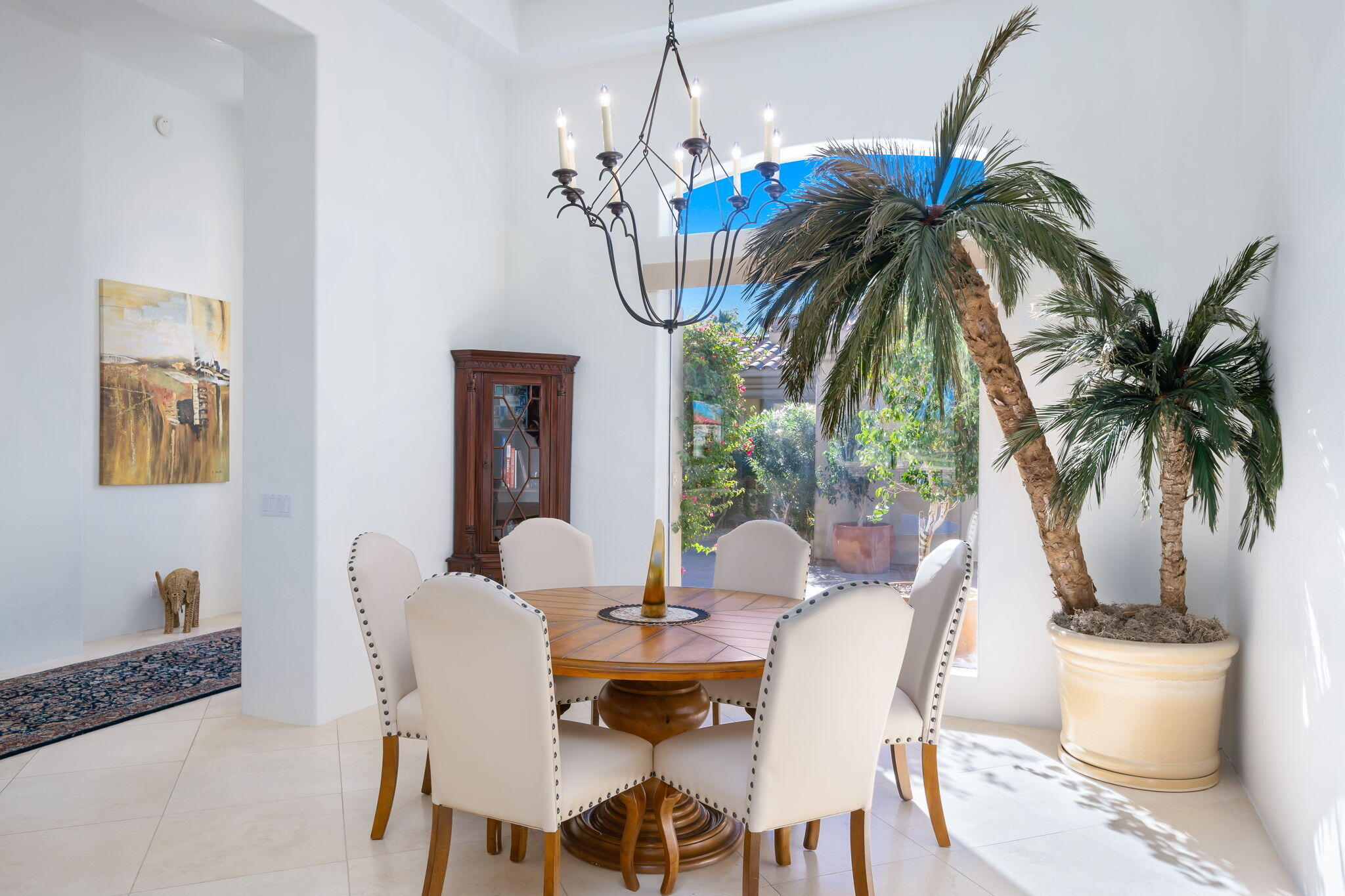 80128 Riviera La Quinta, CA 92253 - Photo 17 of 33 a view of a dining room with furniture and chandelier