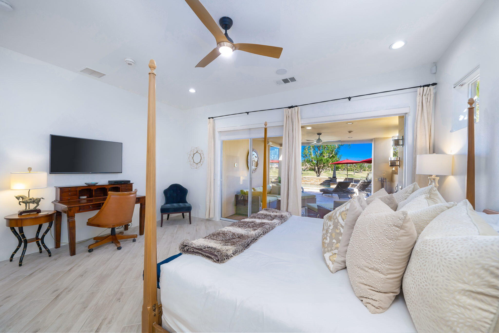 80128 Riviera La Quinta, CA 92253 - Photo 19 of 33 a bed room with a bed and a flat screen tv