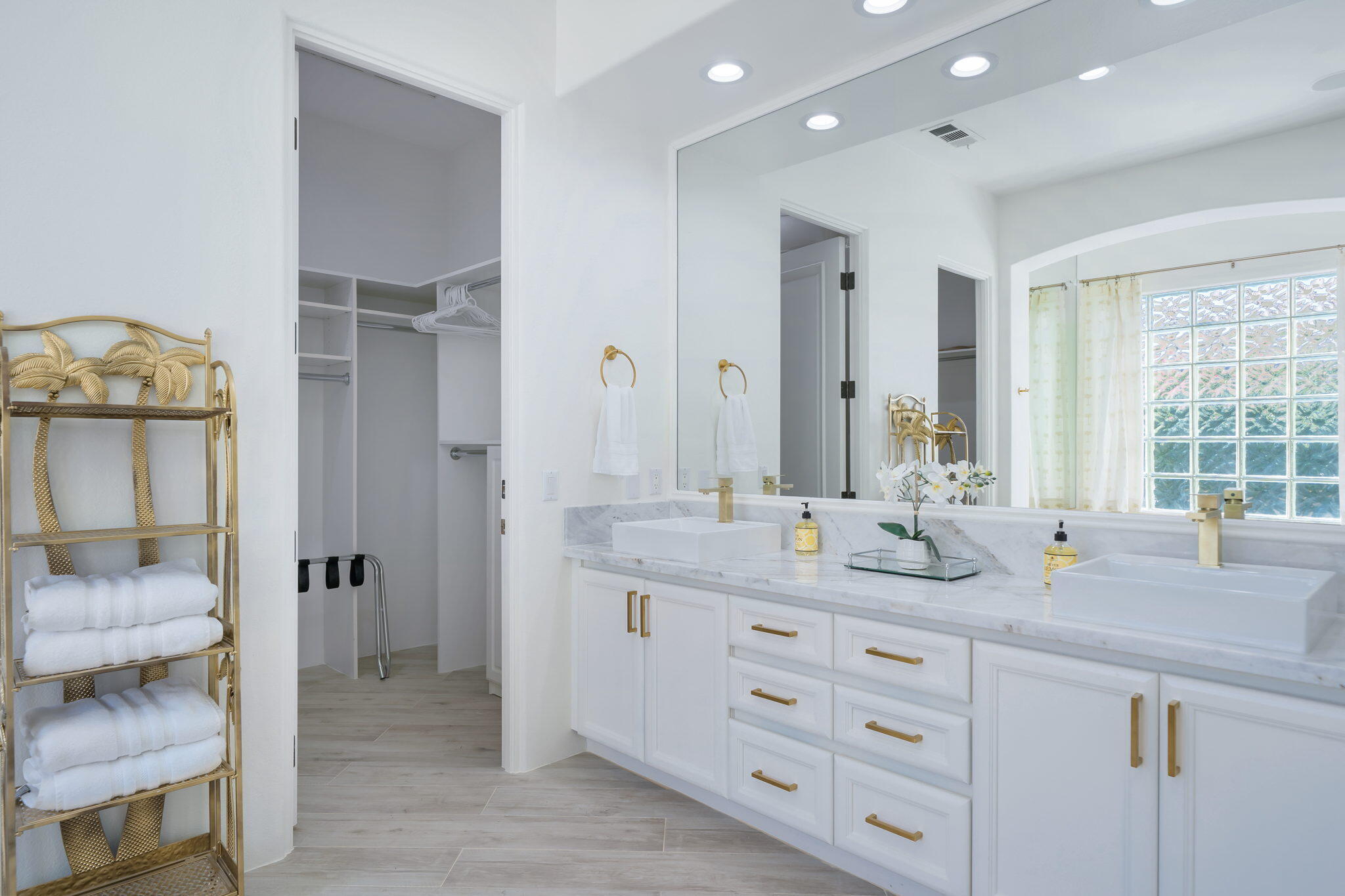 80128 Riviera La Quinta, CA 92253 - Photo 20 of 33 a bathroom with a double vanity sink and a mirror