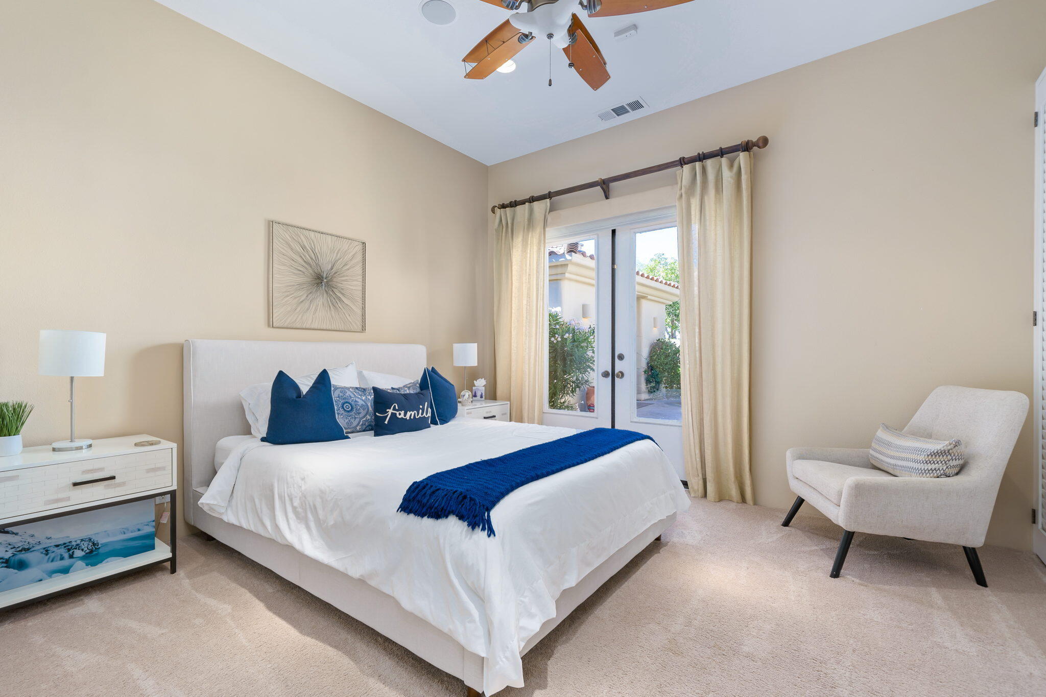 80128 Riviera La Quinta, CA 92253 - Photo 22 of 33 a bedroom with a bed and a window