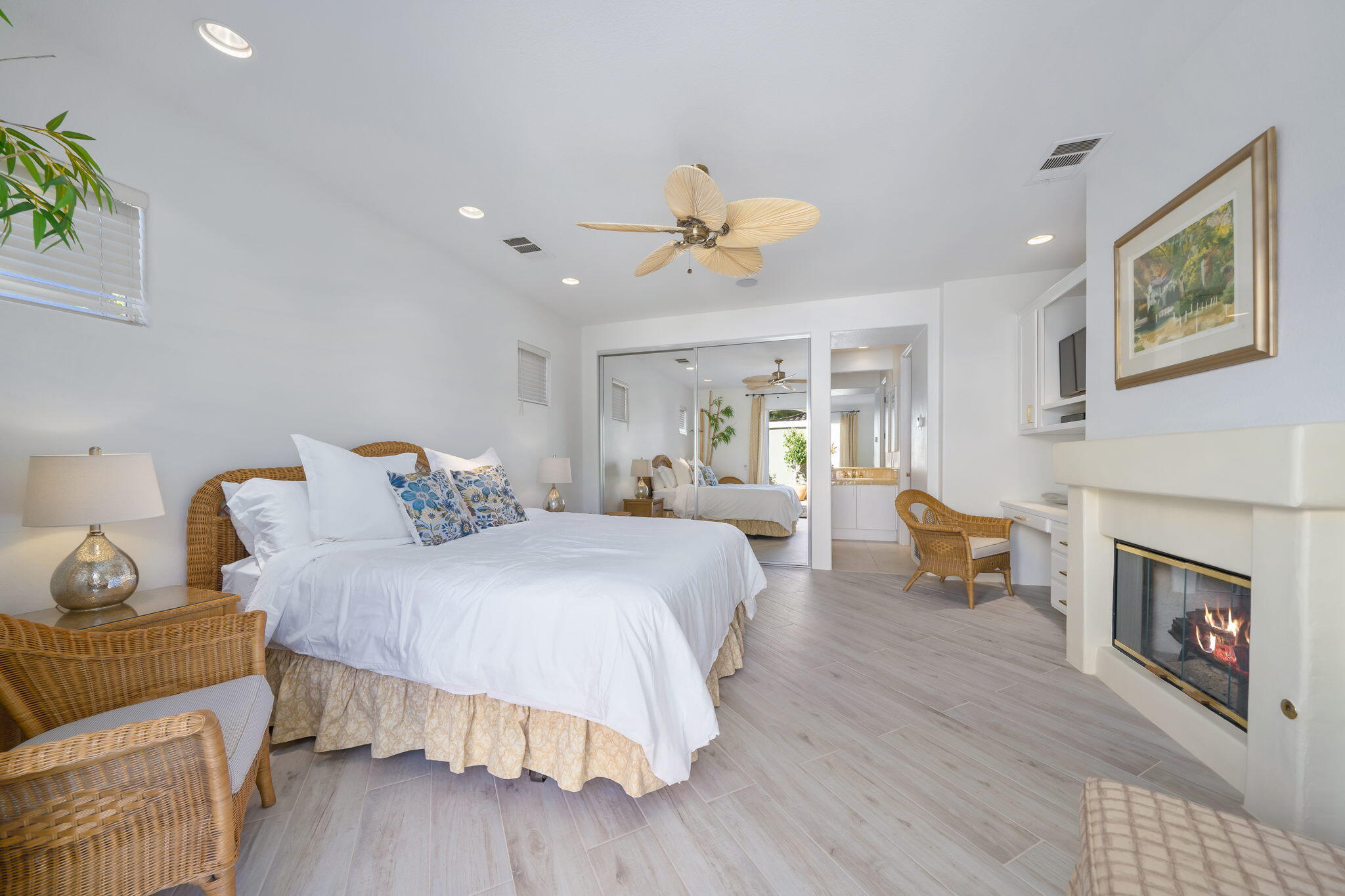 80128 Riviera La Quinta, CA 92253 - Photo 28 of 33 a bedroom with a bed and wooden floor