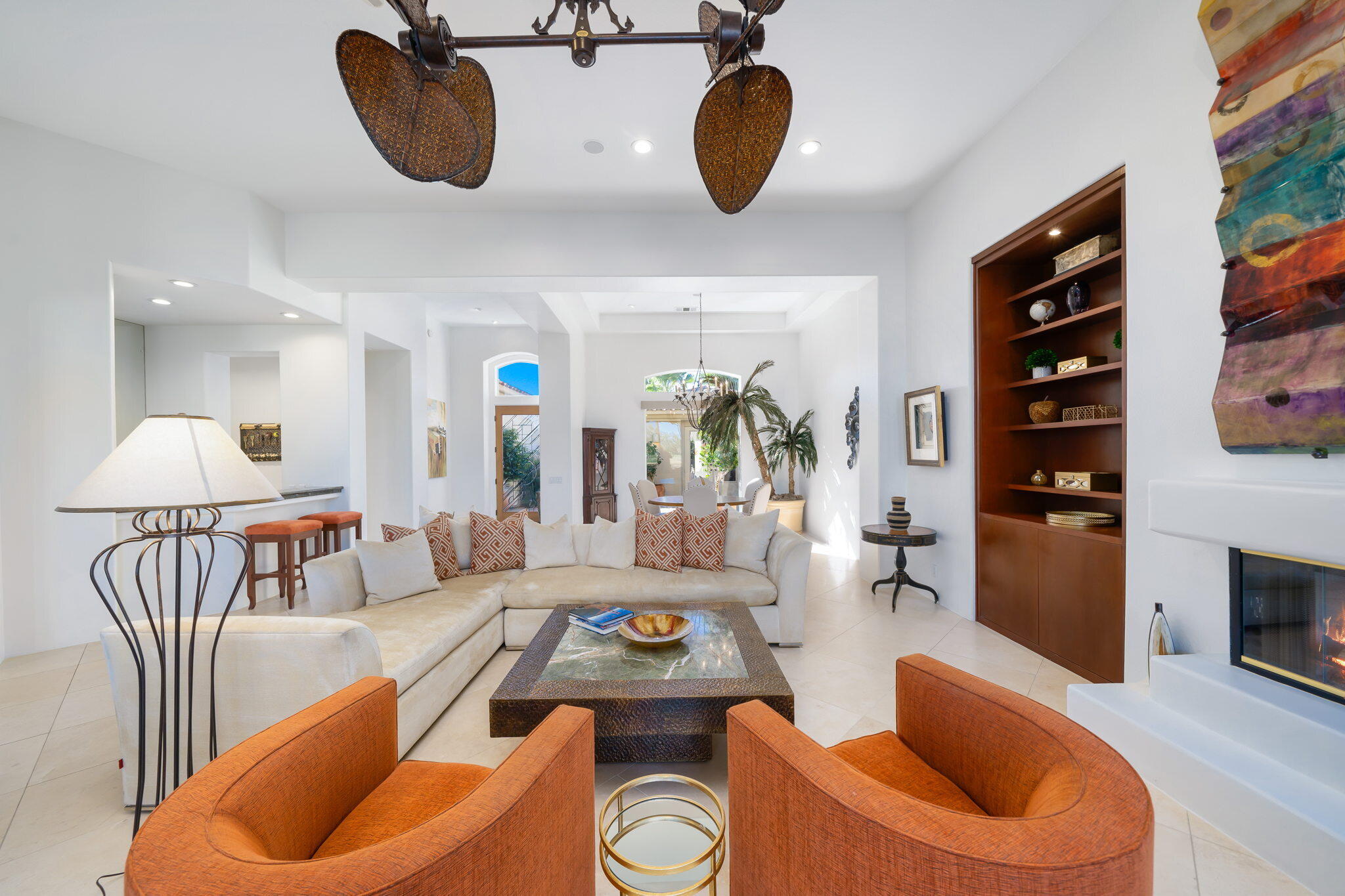 80128 Riviera La Quinta, CA 92253 - Photo 6 of 33 a living room with furniture and a fireplace