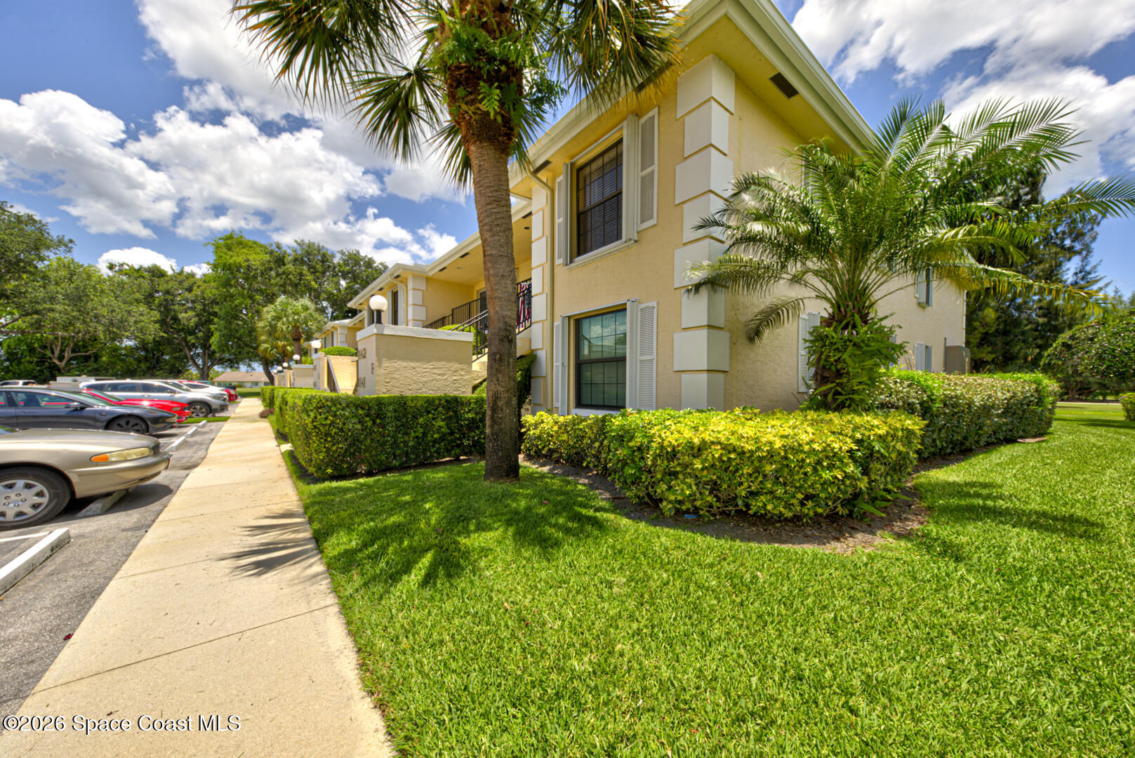 1142 Keystone Drive, Unit F Jupiter, FL 33458 - Photo 2 of 43 front of condo right