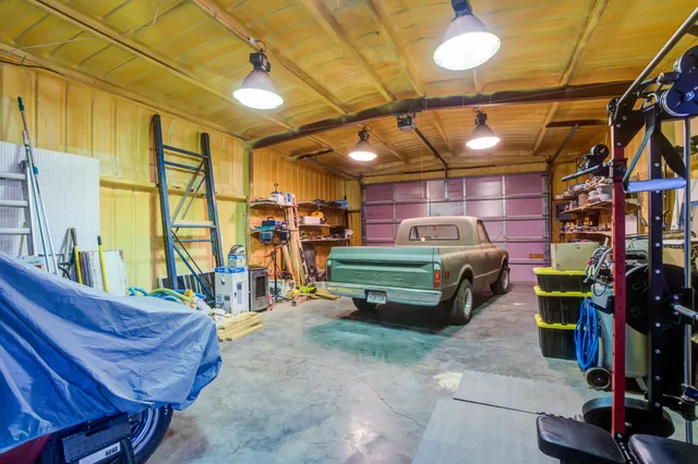 a view of a garage with furniture