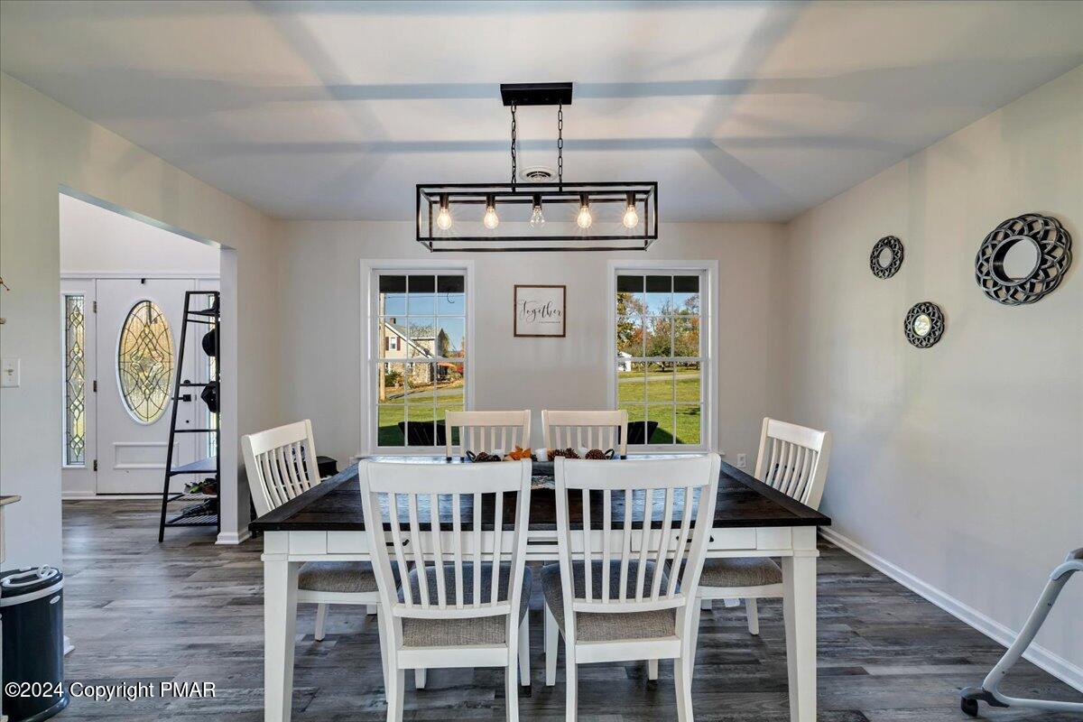 439 5 Points Richmond Road Bangor, PA 18013 - Photo 18 of 50 a view of a dining room with furniture window and wooden floor