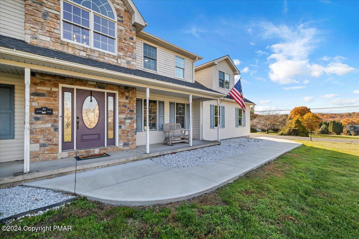 439 5 Points Richmond Road Bangor, PA 18013 - Photo 3 of 50 a front view of a house with garden